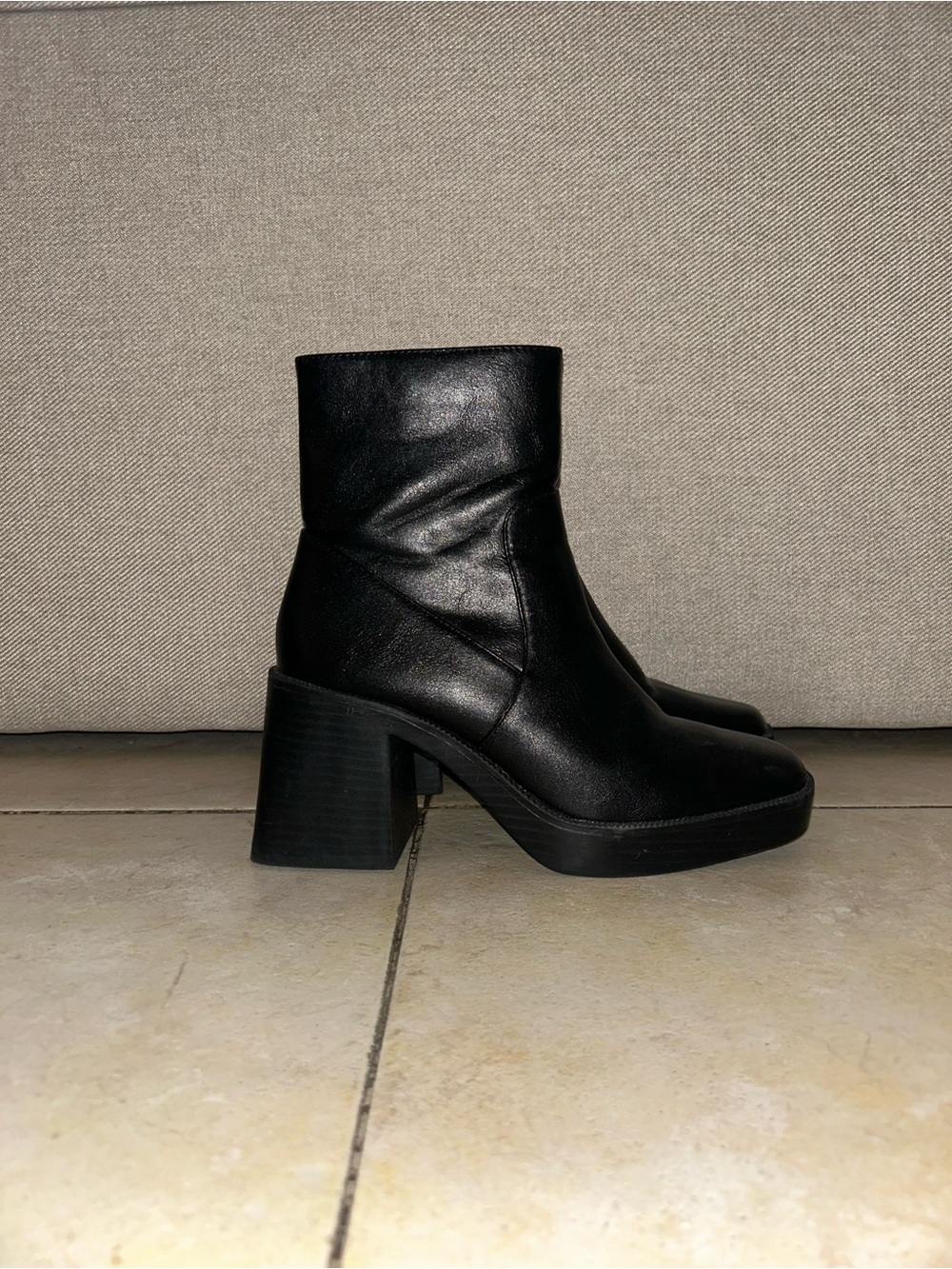 Sleek Black Leather Block Heel Ankle Boot